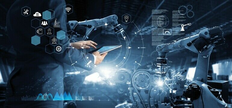 Manager_Technical_Industrial_Engineer_working_and_control_robotics_with_monitoring_system_software_and_icon_industry_network_connection_on_tablet._AI,_Artificial_Intelligence,_Automation_robot_arm