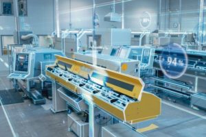 Futuristic_Design:_Factory_Digitalization_with_Information_Lines_Lying_Through_the_High-Tech_Modern_Electronics_Facility._CNC_Automatic_Machinery_Manufacturing_Products_Using_IoT_Industry_4.0