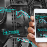 Augmented_Reality_technology_maintenance_and_service_of_mechanical_parts,_technician_using_smartphone_with_AR_interface_on_screen_in_smart_industry,_automated_monitoring_process