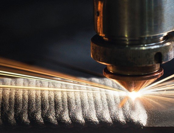 Cutting_of_metal._Sparks_fly_from_laser,_close-up