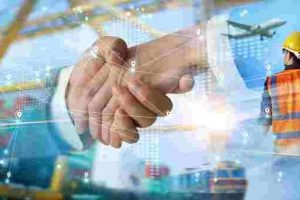 Smart_logistics_and_transportation._Handshake_for_successful_of_investment_deal_teamwork_and_partnership_business_partners_on_logistic_global_network_distribution._Business_of_transport_industrial._