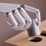 Robotic_Hand_with_Cylinder_and_Shape_Sorting_Toy_Closeup._Machine_Learning_and_Recognition_Concept_3d_Illustration