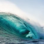 Big_wave_barrel_unloads_in_the_surf.